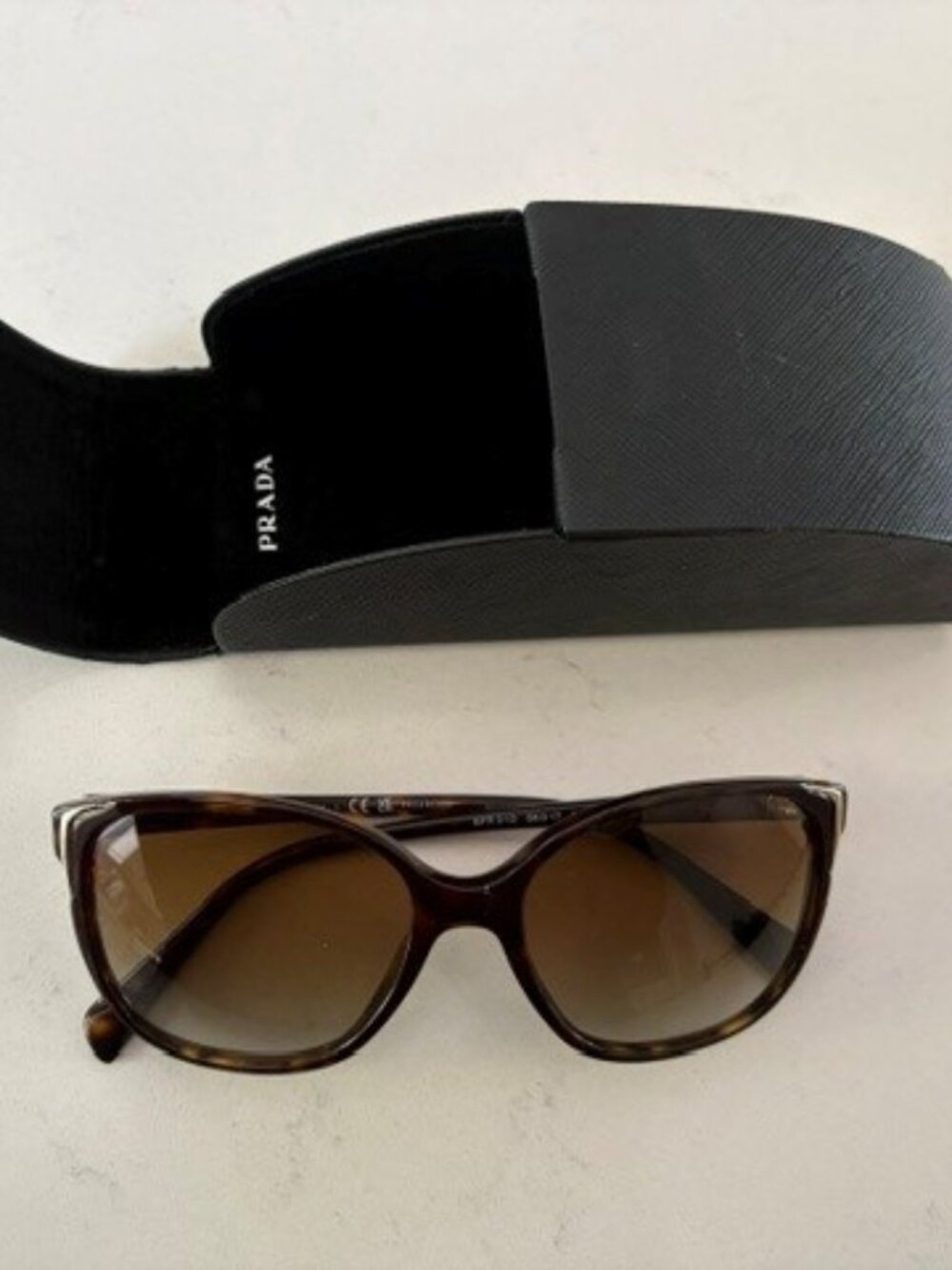 PRADA SPR 010 Tortoiseshell Polarized Sunglasses – Brown Gradient Lenses